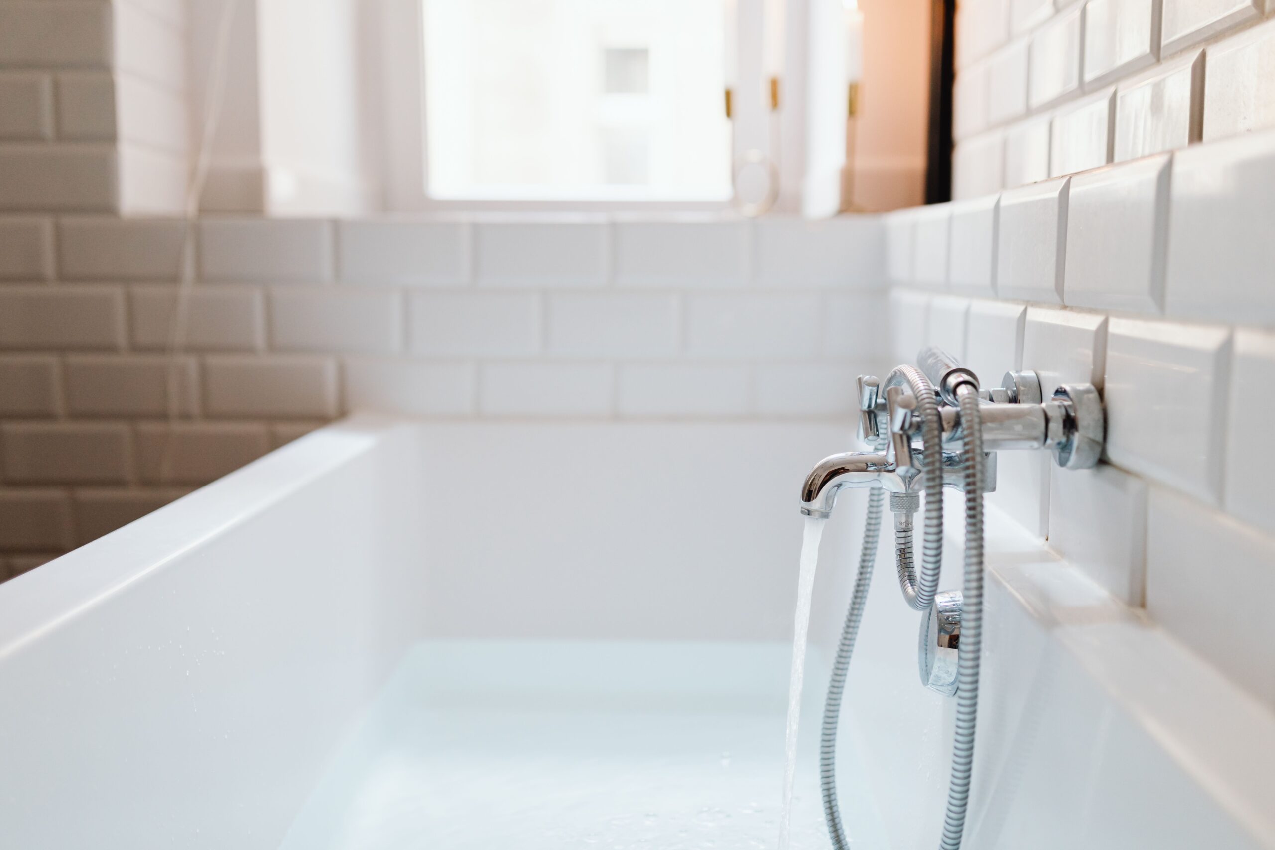 Professional cleaning team working in a modern home